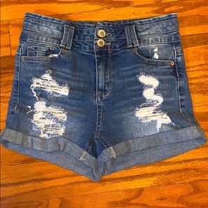 Jean shorts with rips and two buttons
